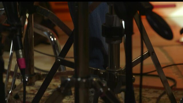 Musician plays the drums. Close-up hi hat pedal