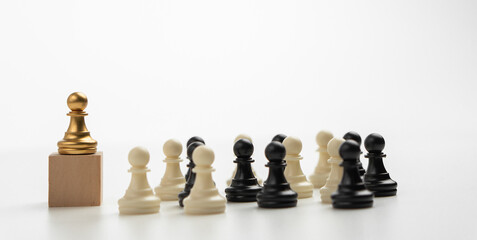 The leadership of the Golden Chess pawn standing on the box show influence and empowerment. Concept of business leadership for leader team, successful competition winner and Leader with strategy