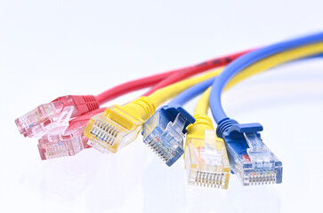 colorful LAN cable on white background closeup