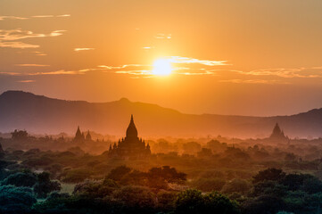 Myanmar (ex Birmanie). Bagan, Mandalay region. Sunset at the plain of Bagan with there temple