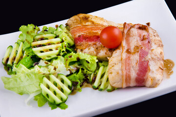 Tender zander in bacon: zander fillet, smoked bacon, pomegranate sauce narsharab, cucumbers,...