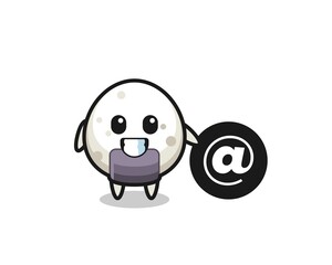 Cartoon Illustration of onigiri standing beside the At symbol
