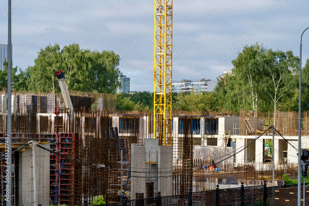 Poster pit construction site with formwork and reinforcement. steel reinforcement structure of rebars for c