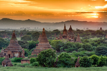 Myanmar (ex Birmanie). Bagan, Mandalay region. Sunset at the plain of Bagan with there temple
