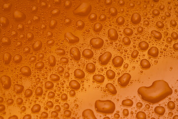 Water Drops On Orange Background Texture colorful waterdrop.