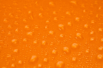 Water Drops On Orange Background Texture colorful waterdrop.