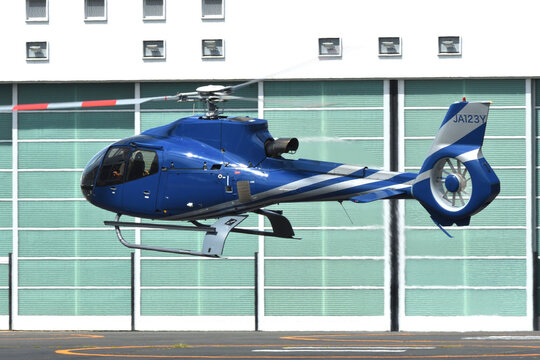 Tokyo, Japan - August 11, 2021:Shizuoka Air Commuter Eurocopter EC130B4 (JA123Y) light utility helicopter.
