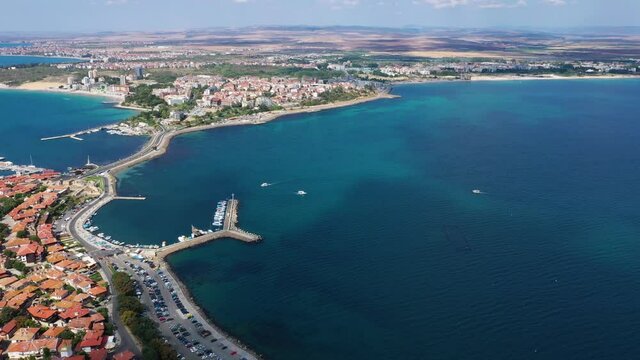 Flying drone over Nesebar island city on Bulgaria Black Sea coast, medieval Mesembria.