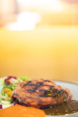 Cooked minced beef patty with vegetables