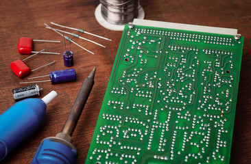 Repair of electronic devices, circuit board, soldering iron, tin soldering parts.