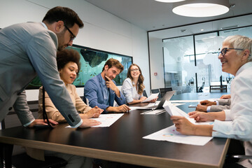 Creative managers crew working with new startup project in office. Team brainstorming.