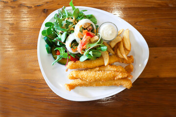 fish and chip or fried fish ,deep fried fish with French fries and salad