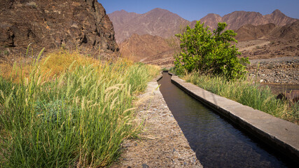 The traditional falaj irrigation system in the mountain village of Al Hoqain in Oman