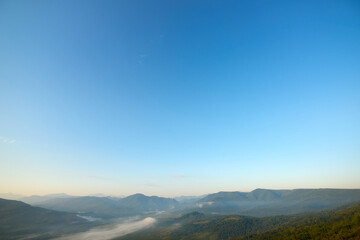 Obraz na płótnie Canvas Sunrise in the mountains. Sunrise over the mountain valley.