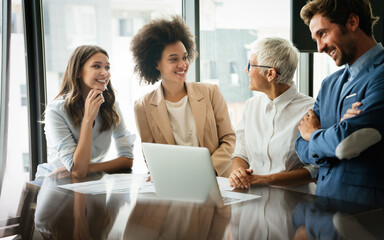 Group of multiethnic business people working at busy modern office
