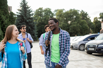 Naklejka premium Group of high school students talking and laughing