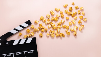 popcorn and clapperboard. Cinema background.Top view with copy space. Flat lay
