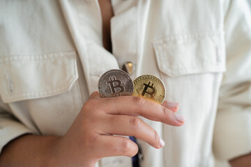 Unrecognizable hands holding cryptocurrencies