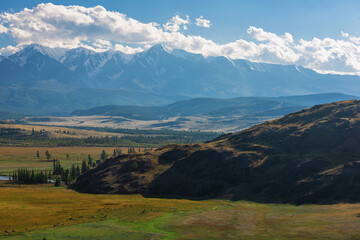 Fototapeta na wymiar Kurai steppe and North-Chui ridge on background. Altai mountains, Russia.