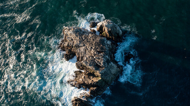 aerial photohorizontal of rock in the sea, matanzas, chile