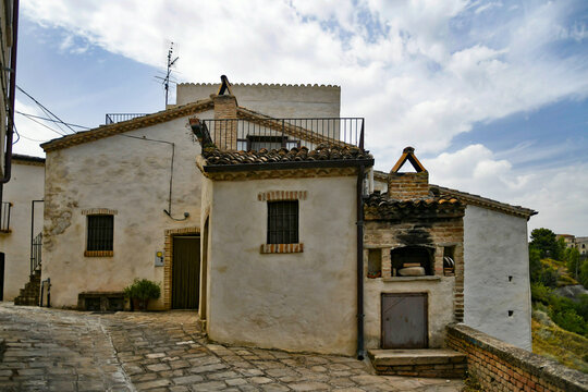 The facade of an old house in the historic center of Aliano, a medieval town in the Basilicata region, Italy.