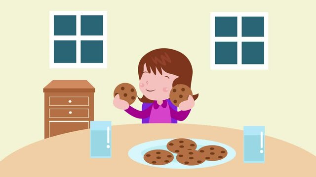 Happy little girl eating cookies in dining room