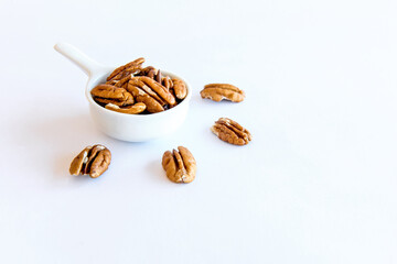 Nuts on white background. Healthy grains.