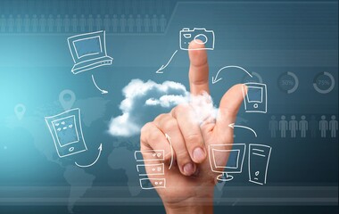 Hand typing on keyboard on modern laptop
