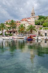 Fototapeta na wymiar Picturesque bay in Splitska village. Splitska is situated on the north coast of Brac island in Croatia.