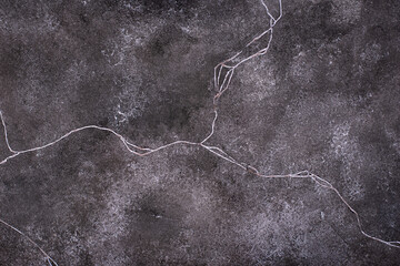 Dark abstract concrete crackle background