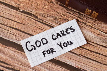 God Jesus Christ cares for you. Love, hope, and faith in the LORD. A handwritten inspiring quote on...