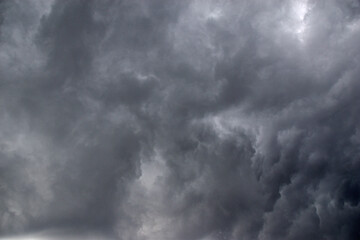 Storm hurricane blue leaden torn clouds on the horizon