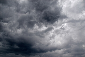 Storm hurricane blue leaden torn clouds on the horizon