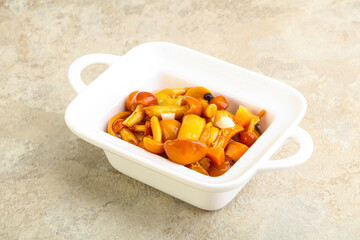 Marinated pickled honey mushrooms in the bowl