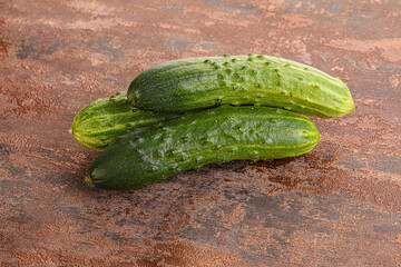 Fersh juicy green cucumbers heap