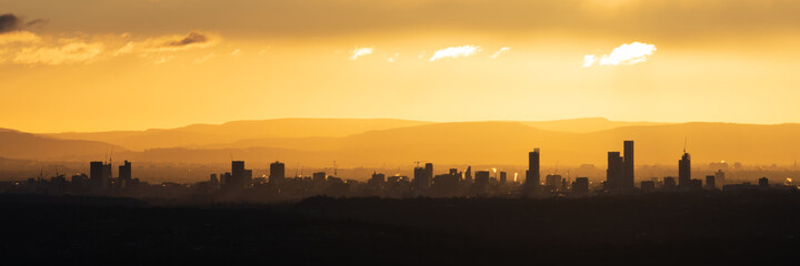 Fototapeta na wymiar Sunrise over Manchester city, panoramic view of the city skyline, England, UK