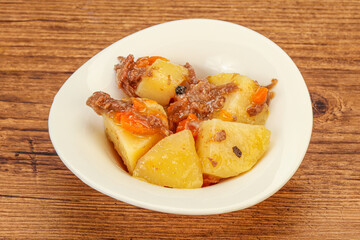 Roasted potato and beef with sauce