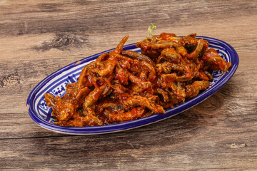 Canned anchovy in tomato sauce