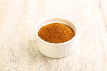 Dry Paprika powder in the bowl