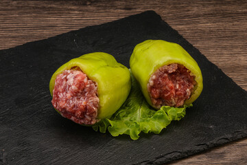 Raw stuffed bell pepper with meat