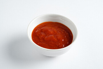 red sauce in the white bowl