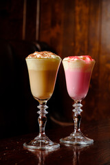 two cocktails on the wooden background