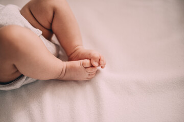 baby feet in bed