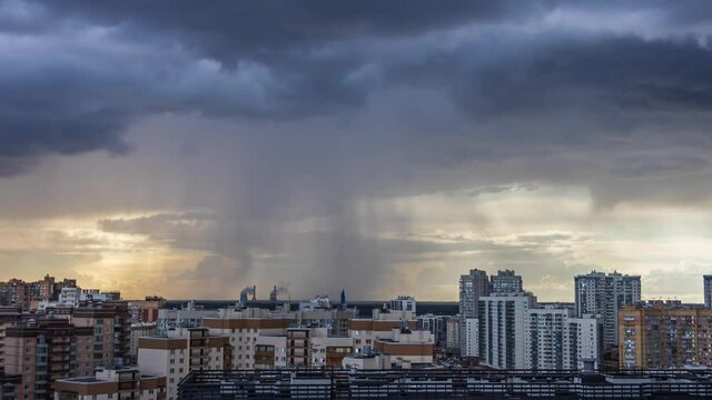 thunderstorm over the city, storm clouds in a storm over the residential buildings of the city
