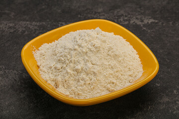 Wheat flour heap in the bowl