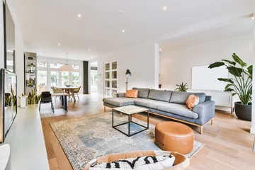 Foto op Plexiglas Elegant and spacious living room with beautiful furniture © Casa imágenes