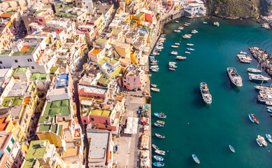 Aerial drone view of Corricella fisherman village in Procida island Naples Italy
