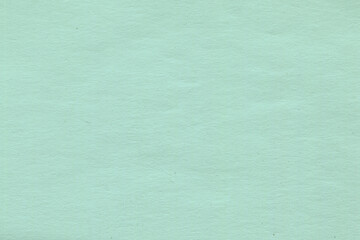 Fototapeta na wymiar Minty blue craft paper texture. Abstract wall paper.