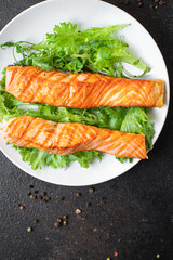 salmon fresh salad leaf fish grill seafood fried grilled snack meal on the table copy space food background keto or paleo diet veggie vegetarian food pescetarian diet