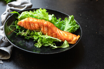 salmon fresh salad leaf fish grill seafood fried grilled snack meal on the table copy space food background keto or paleo diet veggie vegetarian food pescetarian diet